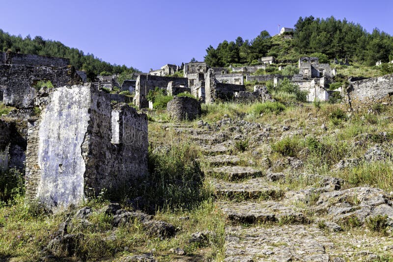 Empty houses at ghost town village Kayakoy ruins near Fethiye, Turkey