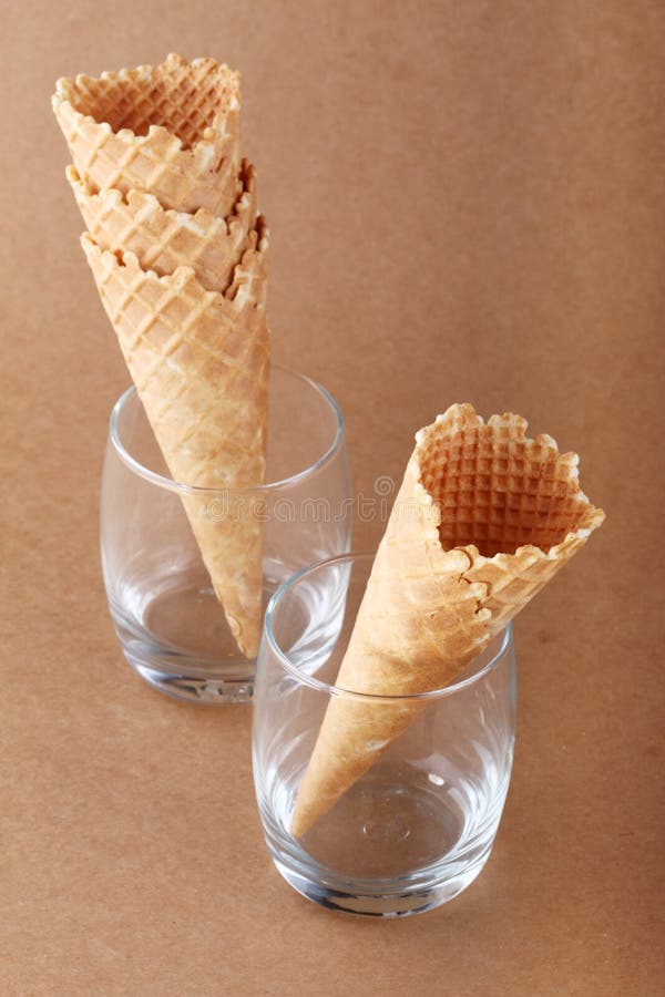 Empty Ice Cream Cone In Clear Glass On White Background Stock Photo