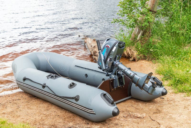 Empty Inflatable Boat with Motor on Shore of Lake or River. Water Transport  for Hobby or Fishing Stock Image - Image of activity, recreation: 248346055