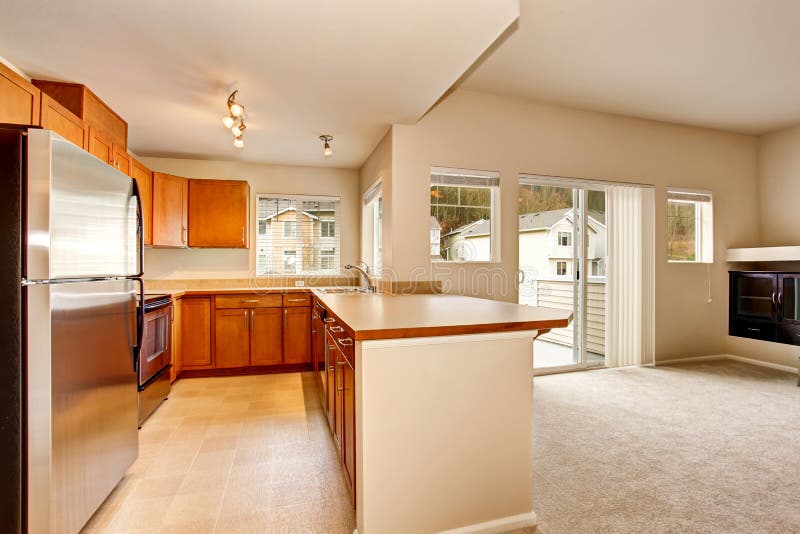 Empty Kitchen Room Interior with Wooden and Tile Floor. Stock
