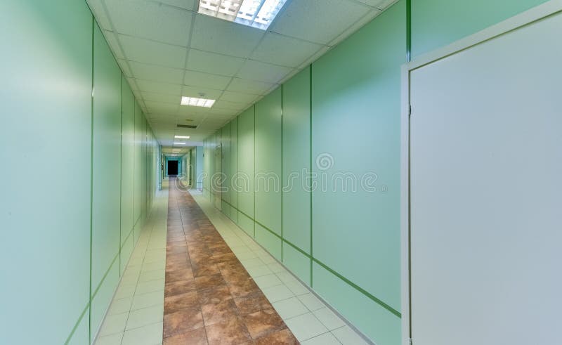 Empty long corridor royalty free stock photo
