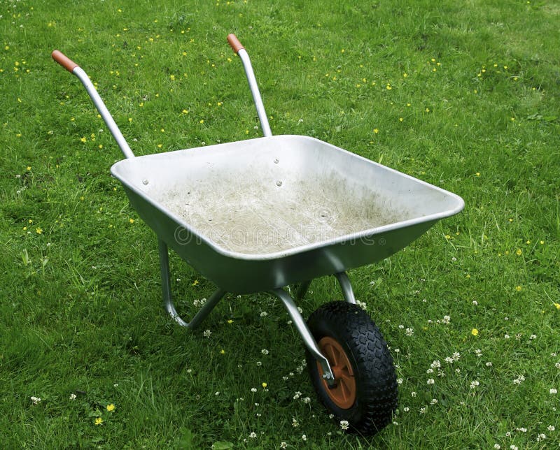 Empty metal wheelbarrow. stock photo. Image of manual 25462774