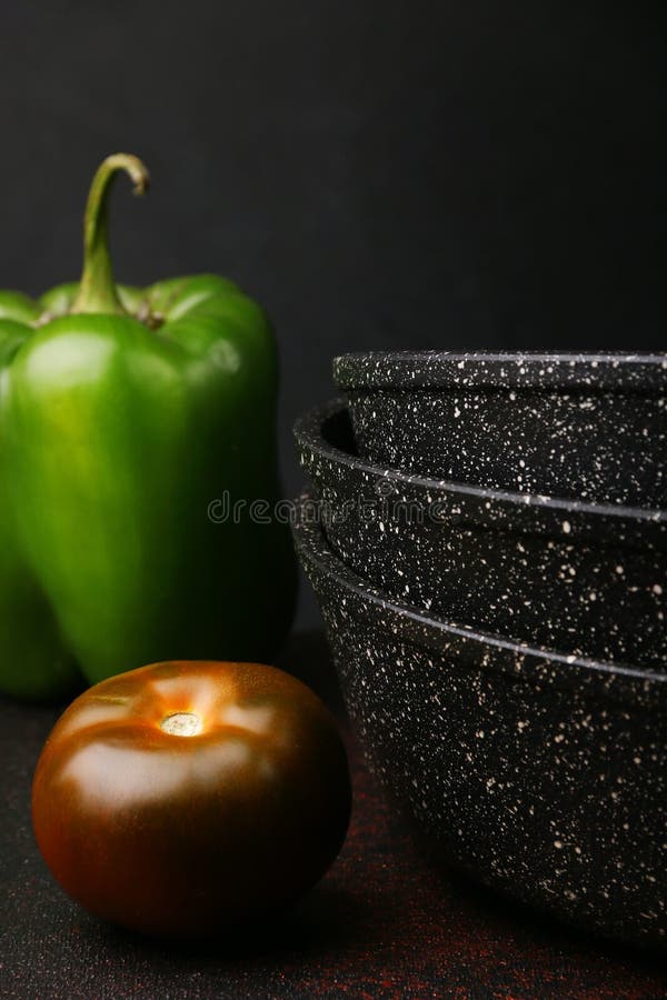 Empty Pan with Ingredients. Cast Iron Pan and Vegetables on Light