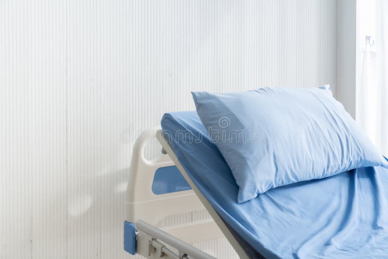 Empty Patient`s Bed Scene with White Wooden Paint Background in Natural  Light Scene / Hospital and Insurance Concept / Ward Room Stock Photo -  Image of healthcare, forearm: 157563550