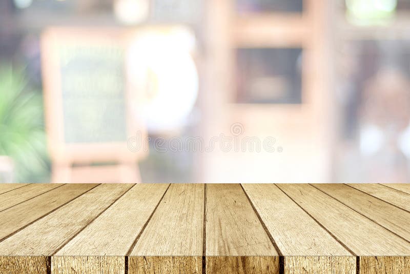 Empty perspective wood, tabletop, over blur restaurant with bokeh light background, food and product display montage background royalty free stock photography