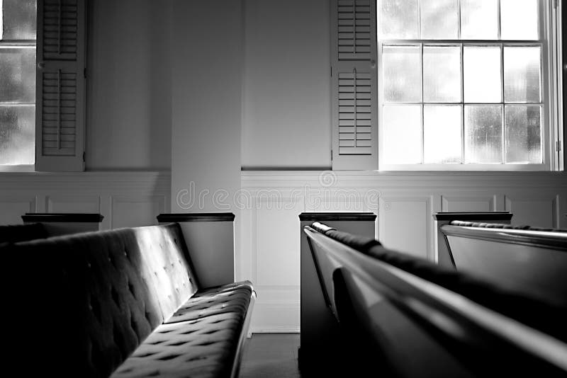 Empty pew bench seating in small church