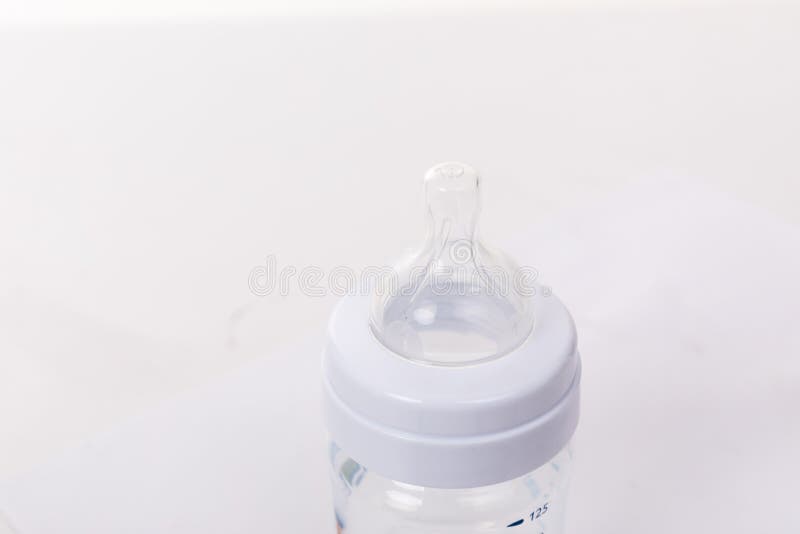 Empty Plastic Bottle with a Nipple for Feeding an Infant with Breast