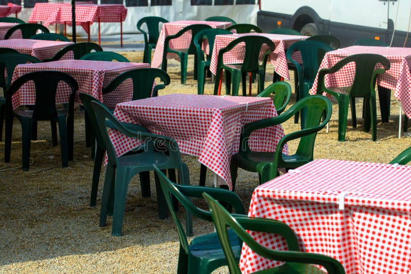 Empty plastic chairs and table on traditional fair royalty free stock photography