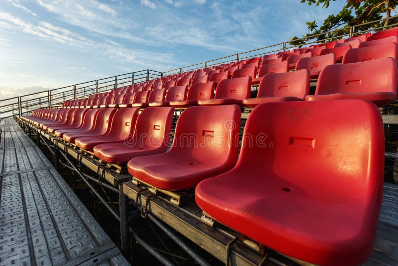 Empty plastic chairs at temporary grandstand stadium in Phuket royalty free stock image