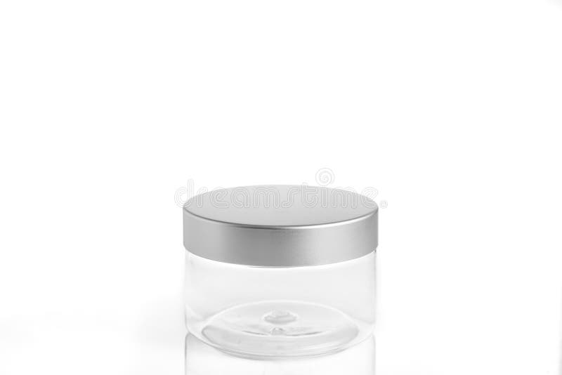 Empty plastic, glass jars cosmetic, lotion packaging on a white background stock photography