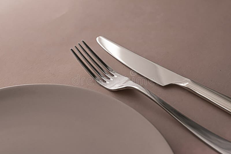 Download Empty Plate And Cutlery As Mockup Set On Brown Background, Top Tableware For Chef Table Decor ...