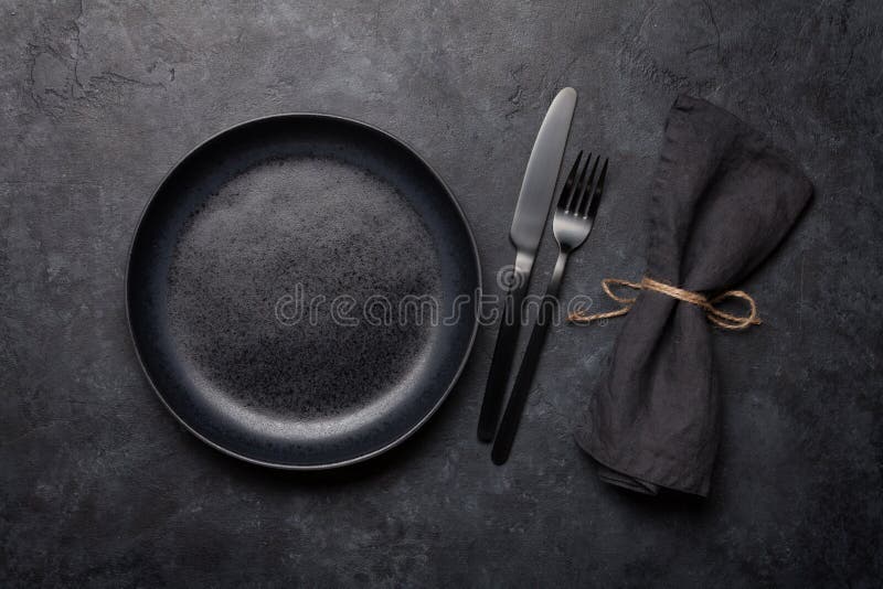 https://thumbs.dreamstime.com/b/empty-plate-fork-knife-empty-plate-fork-knife-black-kitchen-utensils-set-stone-table-top-view-flat-lay-copy-space-166209461.jpg