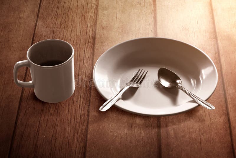  Empty  Plate  On Wooden Table Fasting  Concept Stock Image 