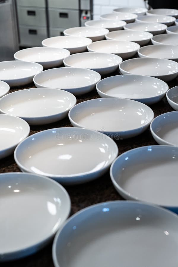 Empty Plates in a Restaurant Kitchen.. Stock Image Image of cooking