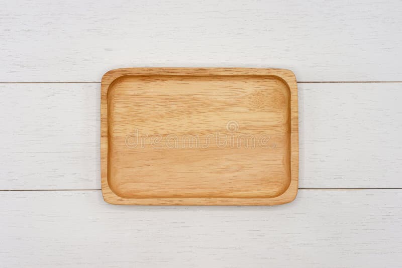 Empty Rectangle Wooden Plate on White Wooden Table. Stock Photo Image