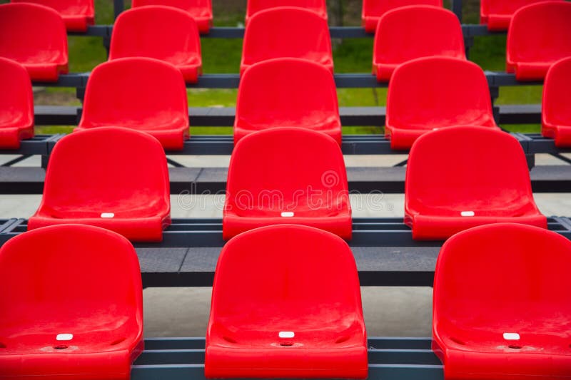 Empty red seats in stadium stock image. Image of seats - 128280643