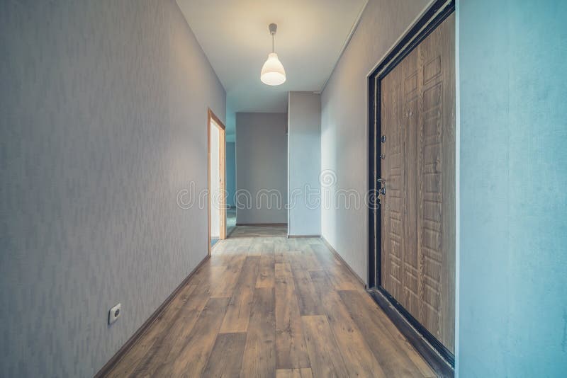 Empty residential house entrance with closed doors