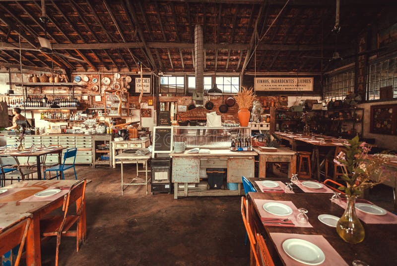 Empty Restaurant In Rustic Building Open Kitchen And Bar