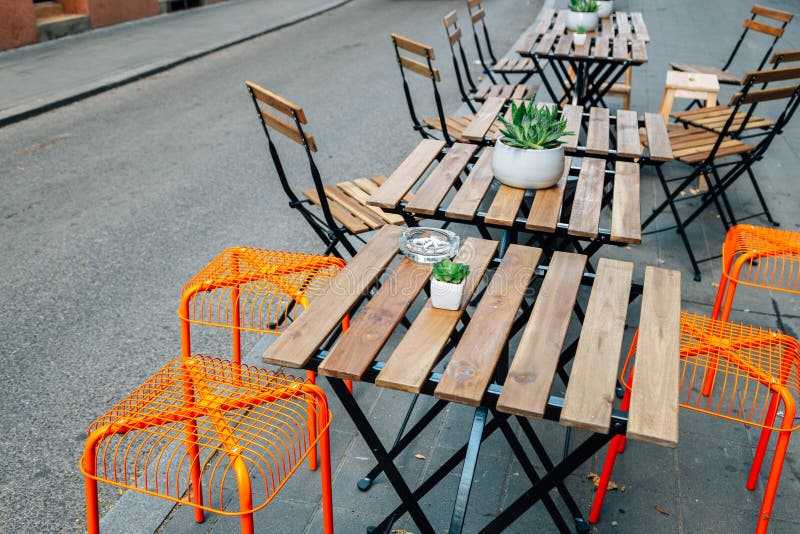 Empty restaurant terrace with tables and chairs in Budapest, Hungary royalty free stock images Empty restaurant terrace with tables and chairs in Budapest, Hungary royalty free stock images