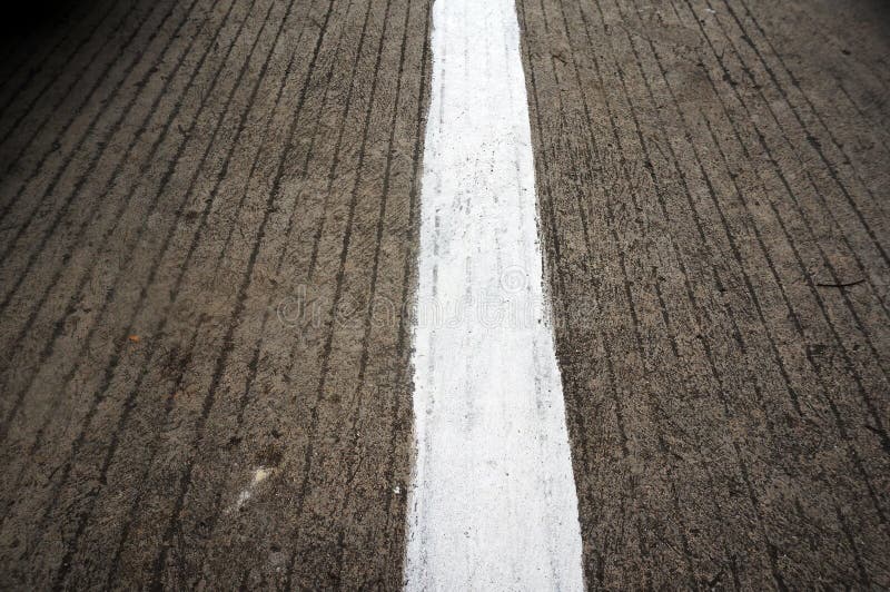 solid white line on the side of the road