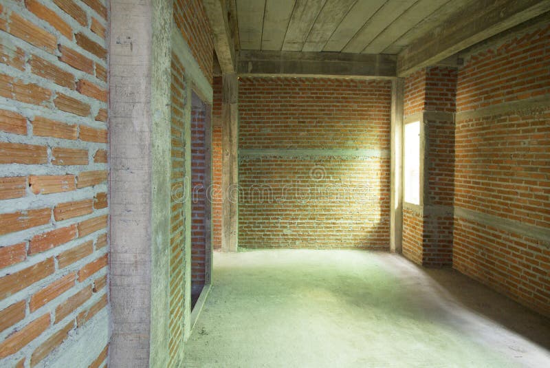 Empty room with brick wall of house under construction royalty free stock photography