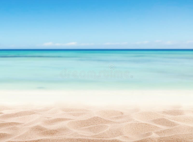 Empty sandy beach with sea
