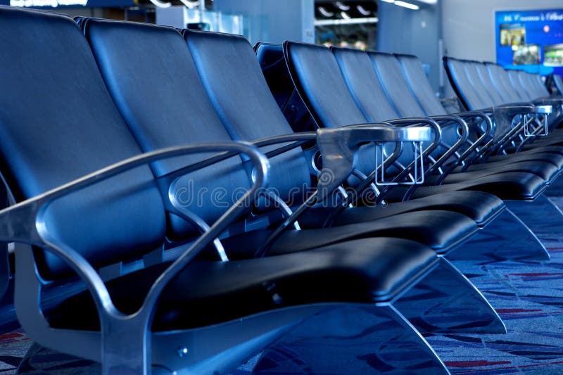 Empty Seats at Airport Gate