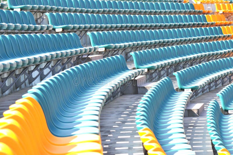 Empty seats at sports stadium stock photos