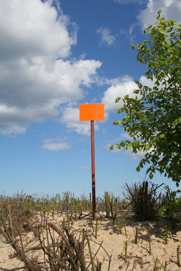 Empty sign post against the sky