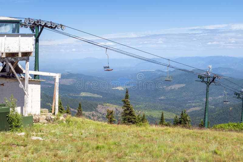 An empty ski lift not operating during summer at a Spokane State Park ski resort overlooking the Spokane, Washington area, USA royalty free stock image An empty ski lift not operating during summer at a Spokane State Park ski resort overlooking the Spokane, Washington area, USA royalty free stock image
