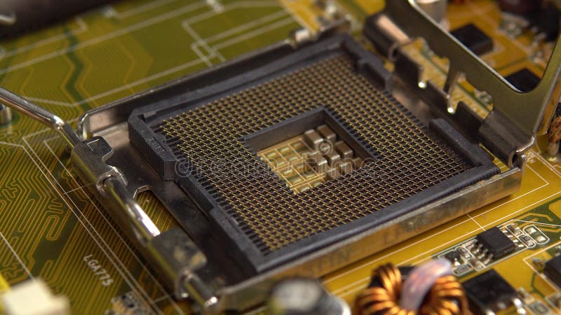 Empty socket for the central processor on the motherboard. The processing system of the central processes of the PC. A royalty free stock photography