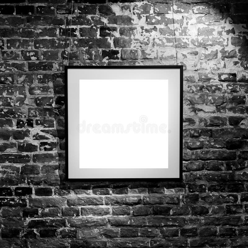 Empty square frame on black brick wall. Blank space poster or art frame waiting to be filled. Square Black Frame Mock-Up