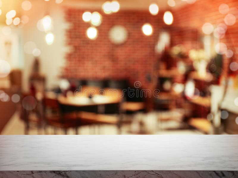 Empty Stone Surface and Blurred View of Furniture Store in Mall Stock
