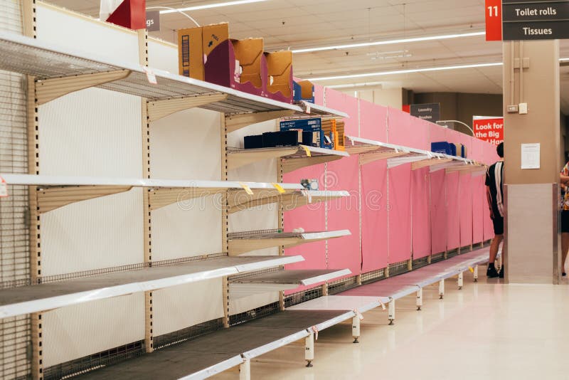 Empty store shelf of toilet paper in supermarket. Quarantine, coronavirus pandemia, covid-19 royalty free stock photo