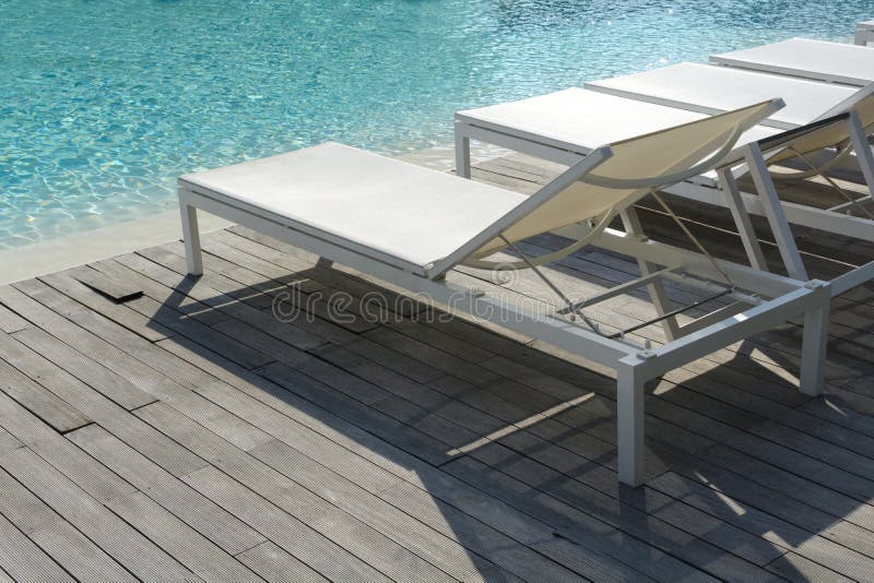 Empty Sunbeds Near the Pool Stock Photo Image of lifestyle, escape
