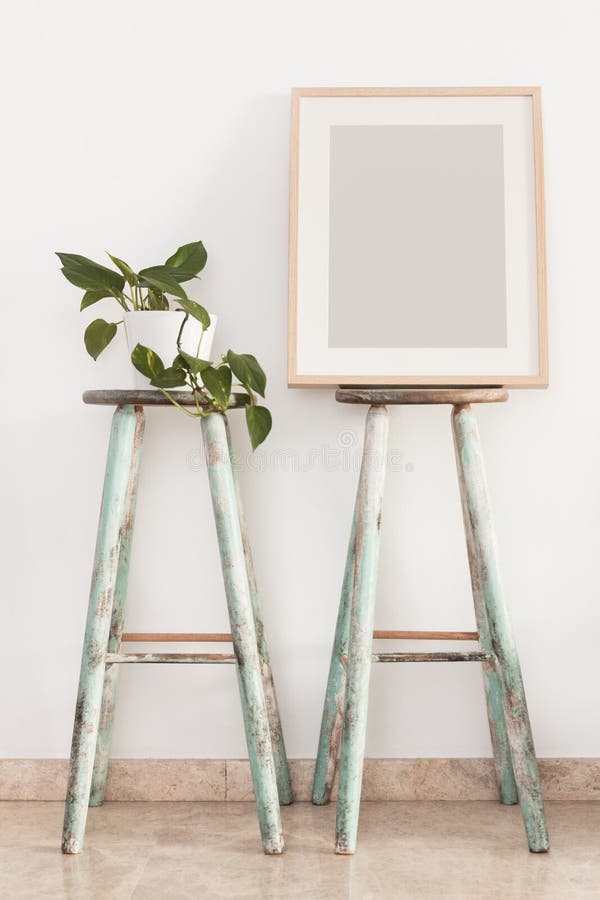 Empty vertical wooden frame inside the living room with Nordic style stock images