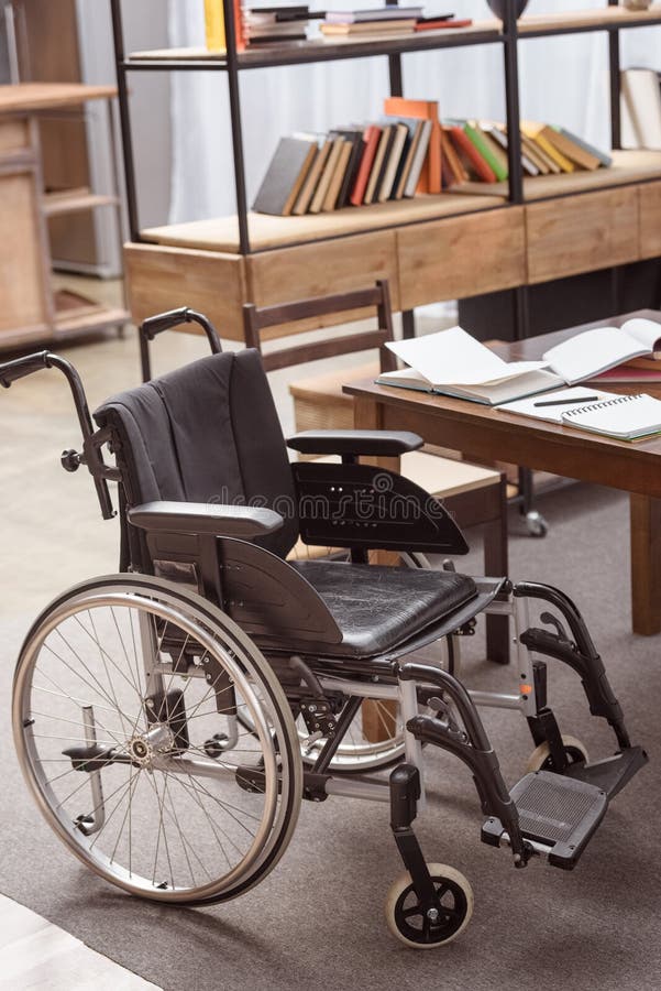 Empty Wheelchair Near Table With Notebooks Stock Image - Image of nobody, cozy: 120885995