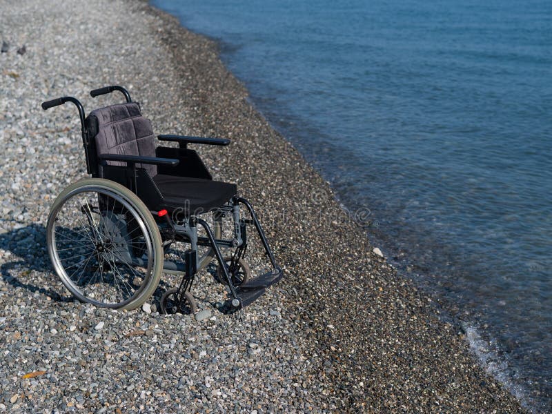 An Empty Wheelchair on a Rocky