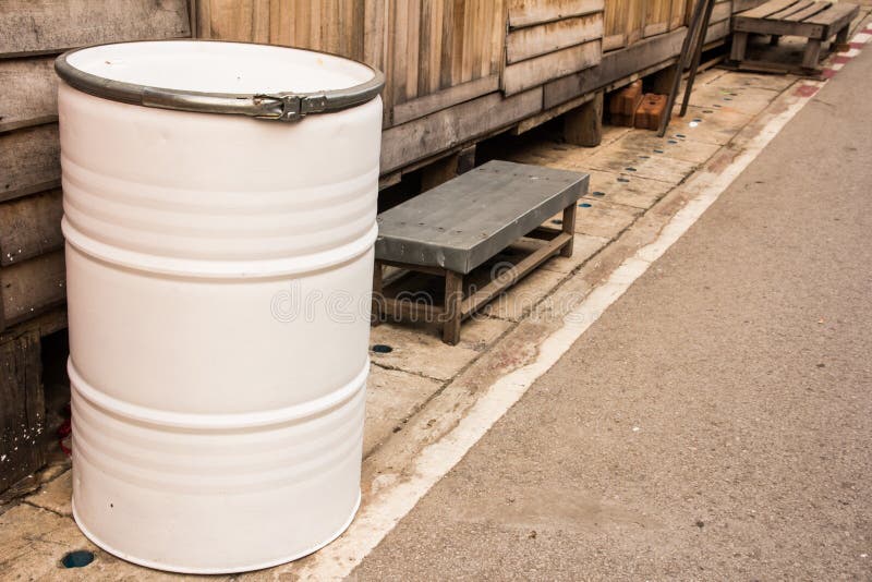 Empty white drum place storefront. Metal steel drum stock images, royalty-free photos and pictures