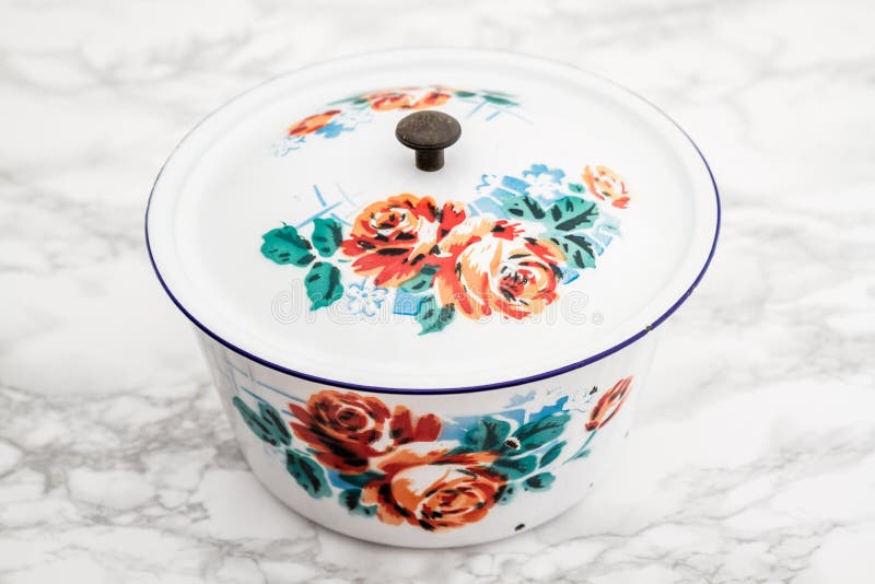 Empty White Vintage Enamel Saucepan with Flower Design Stock Image