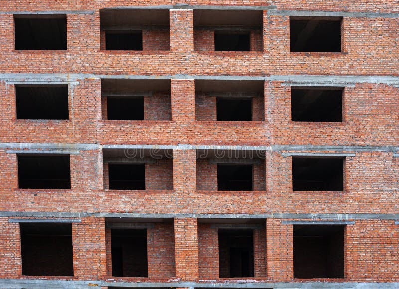 Brick Multistory Building with Holes for Windows Under Construction