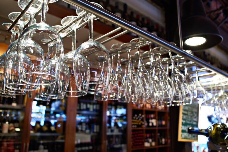 457 Wine Glasses Hanging Above Bar Stock Photos Free & RoyaltyFree