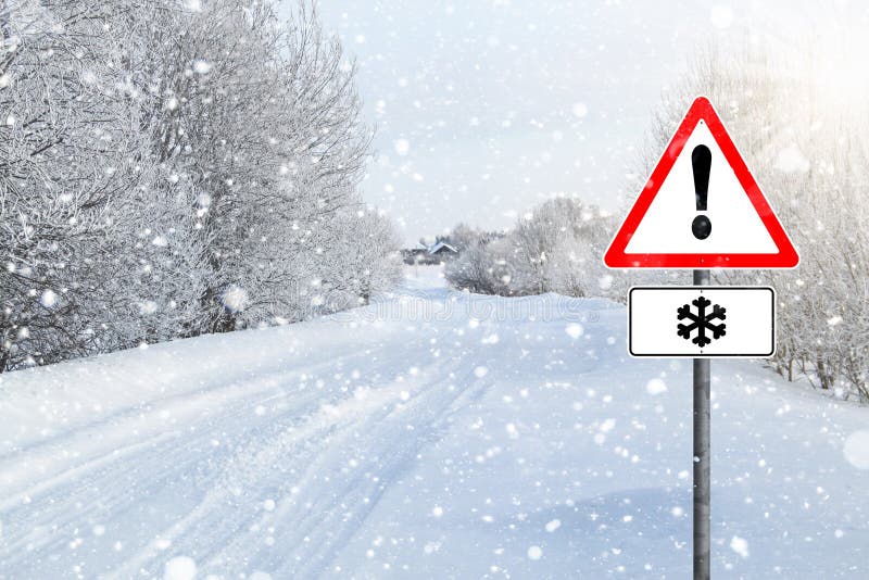 Empty winter road with sign