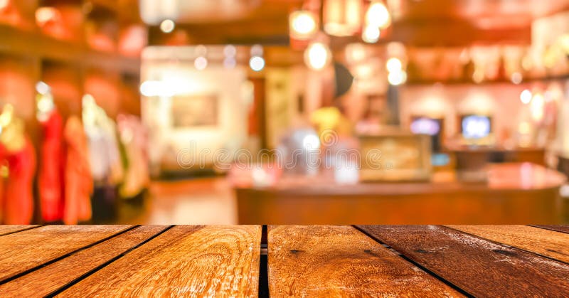 Empty wood table and Coffee shop blur background with bokeh image stock images