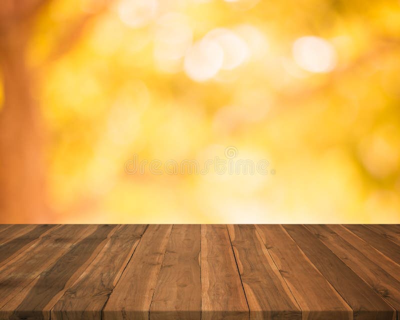 Empty wood table top on blurred abstract autumn background royalty free stock photos
