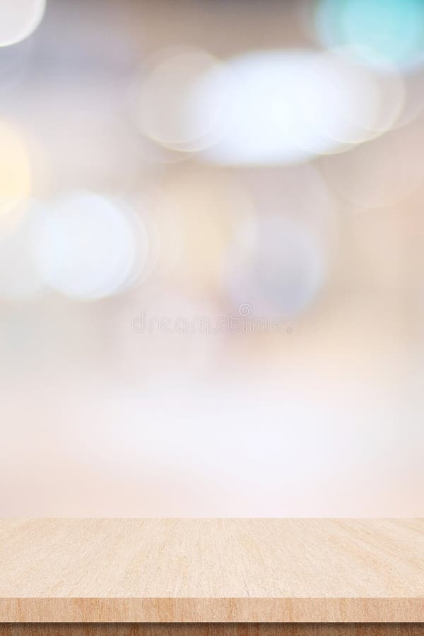 Empty wood table top, counter, desk background over blur bokeh background, Wooden table, shelf and blurred kitchen restaurant for stock images