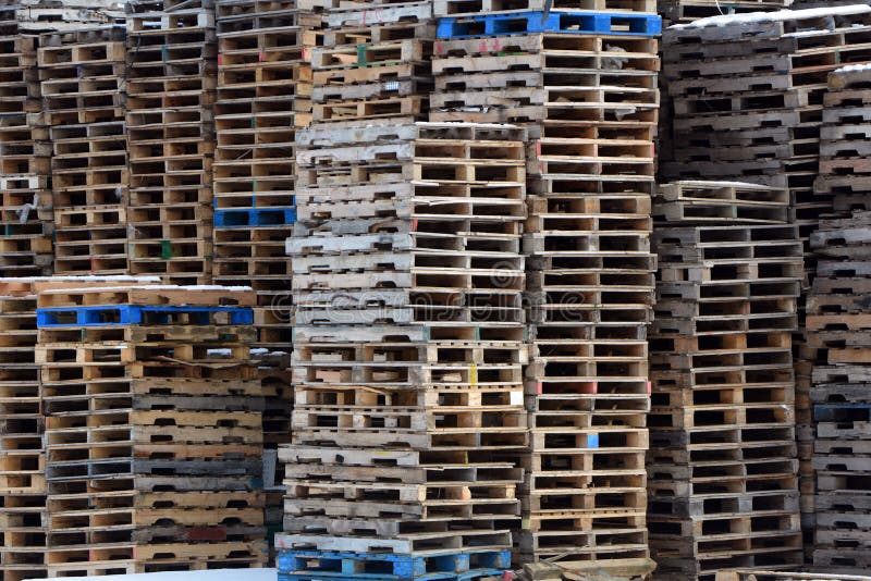 Empty Wooden Pallets Stacked Outside Warehouse Stock Photo - Image of ...