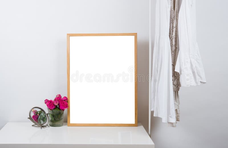 Empty wooden picture frame on the table, art print mock-up stock image Empty wooden picture frame on the table, art print mock-up stock image