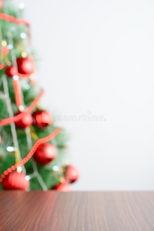 Empty wooden table in the background of decorated Christmas tree royalty free stock images Empty wooden table in the background of decorated Christmas tree royalty free stock images