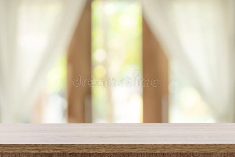 Empty wooden table and blur window background with copy space, display montage for product stock image Empty wooden table and blur window background with copy space, display montage for product stock image